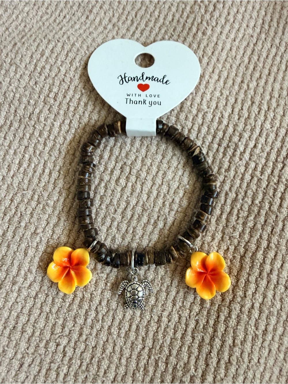 Handmade Coconut Bead Stretch Bracelet with Yellow-Orange Flower & Turtle Charms